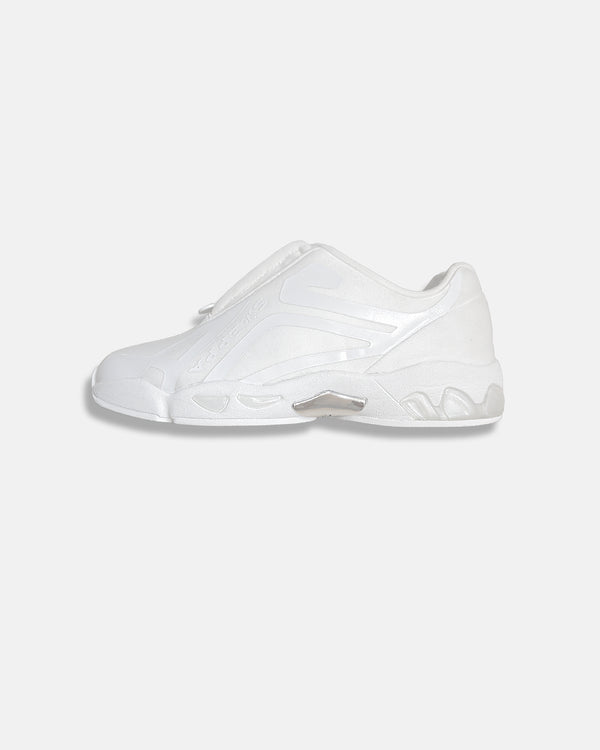 LA SXEPPA White shoe, side profile with the center zip and bubble sole