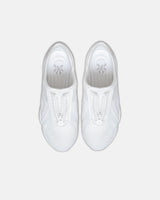 LA SXEPPA White shoe, top-down view of the pair with the chrome medallion at the toe