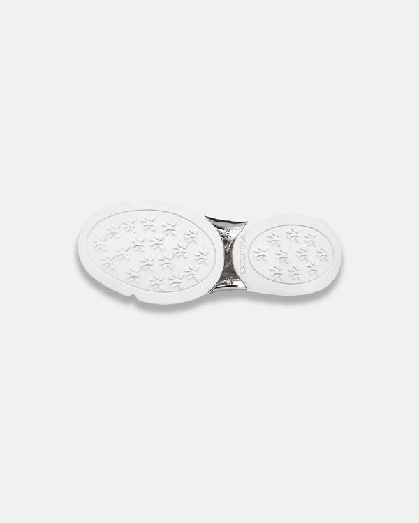 LA SXEPPA White shoe, outsole with bubble tread on a chrome plate